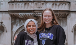 two students smiling